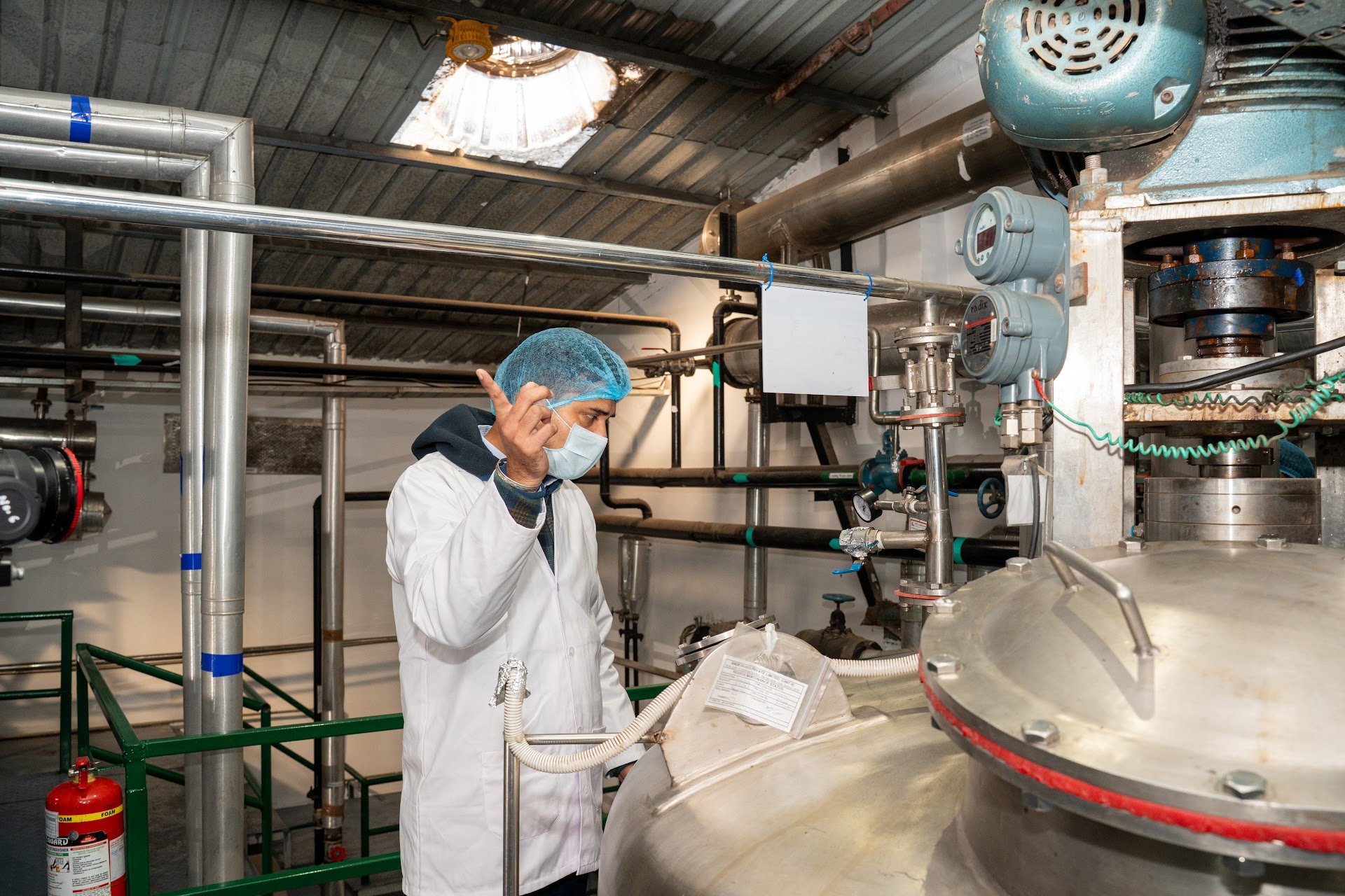 Workers operating equipment